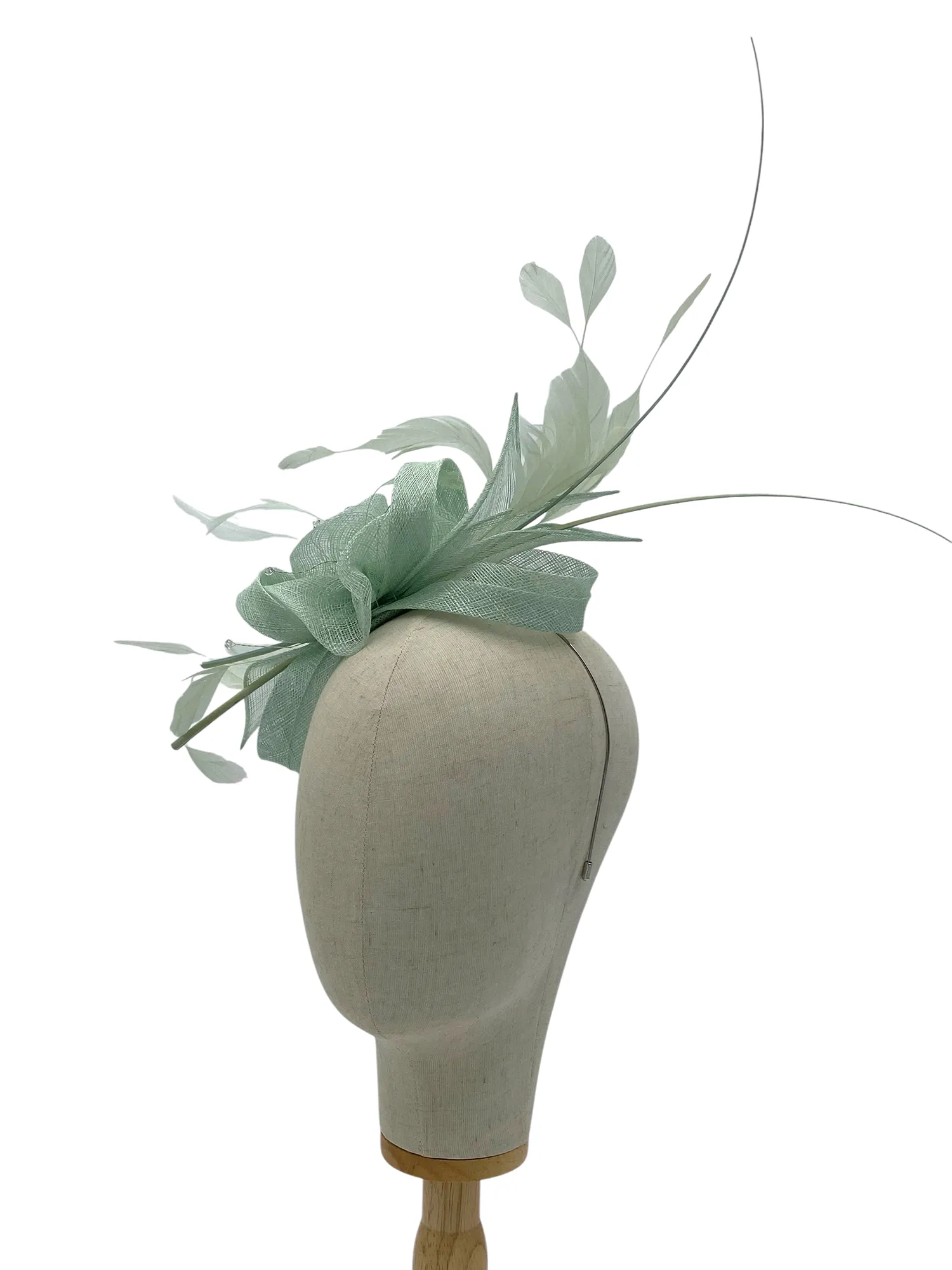 Aqua sinamay wedding or races fascinator with feathers and sinamay swirl, angled view on a mannequin head