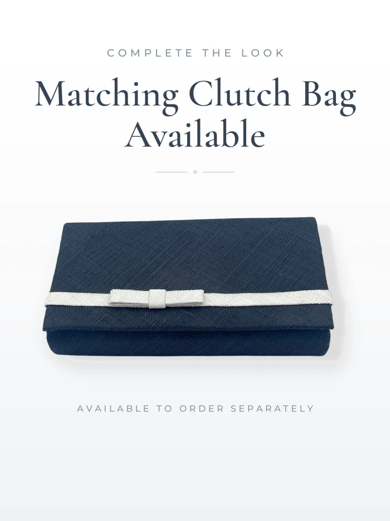 Black and white textured clutch bag on white background, with complete the look slogan