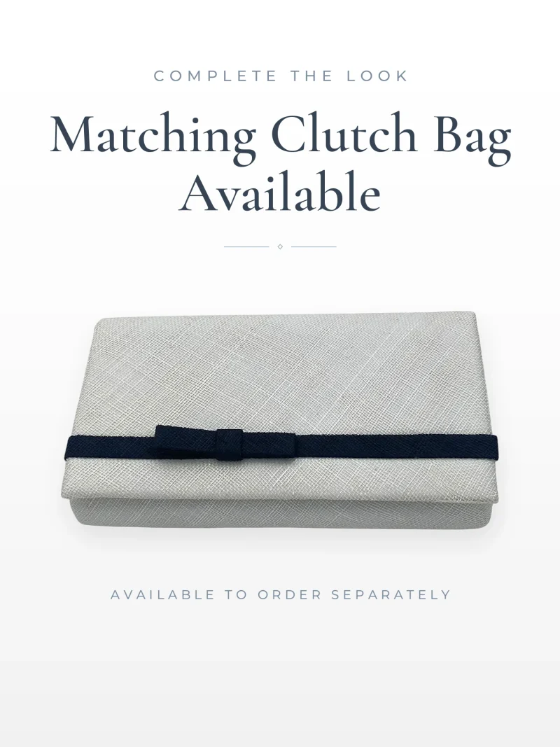 Gray textured clutch bag with a dark navy strap, featured in a clean marketing header that reads 'Matching Clutch Bag Available'.